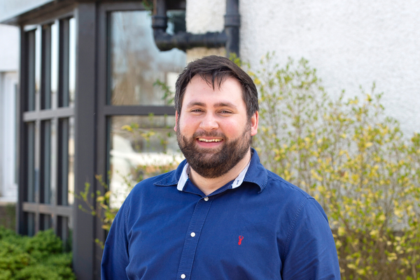 portrait image of Cezary, former graduate of Edinburgh Napier University.
