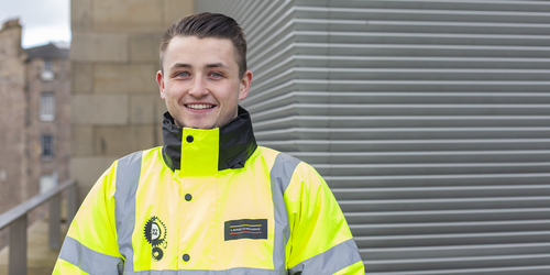 Quantity Surveying Student Evan in a high vis jacket.