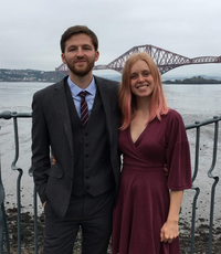 couple by the forth rail bridge