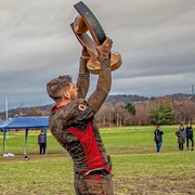 man holding trophy
