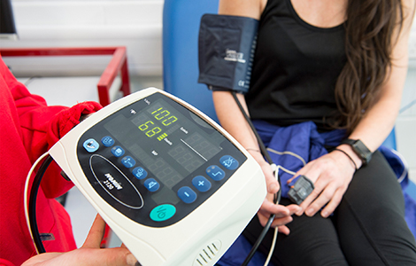 Person hooked up to a Heart monitor