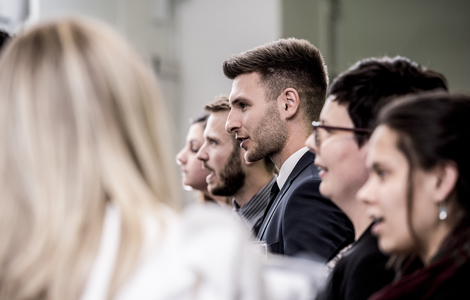 students talking at sales industry event