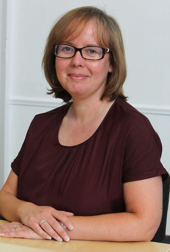 Gillian Macrosson sitting at a table