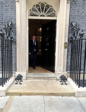 Rob Howieson standing outside Downing Street