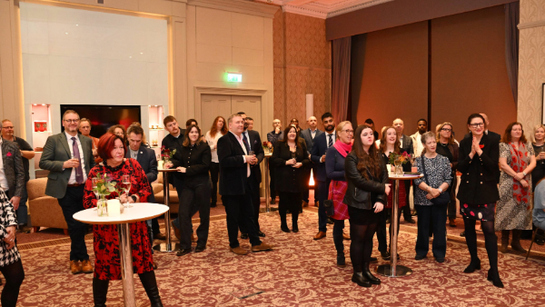 Event attendees watching the awards presentation