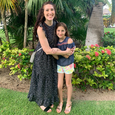 Nicole hugging her daughter