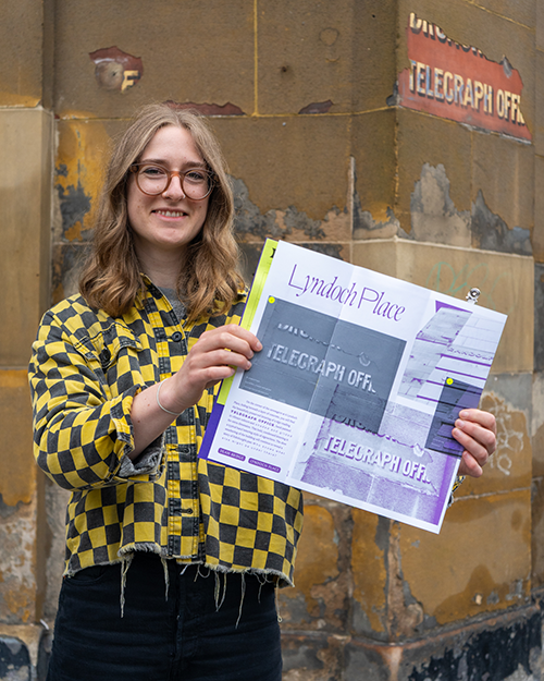 Rosa Marshall with her typography trail brochure created for this year's ENU Degree Show