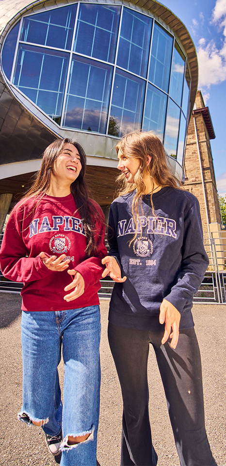 Two female students outside 'The Egg' (Lindsay Stewart Lecture Theatre)