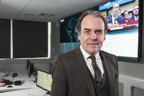 Prof Bill Buchanan standing in a cybersecurity lab