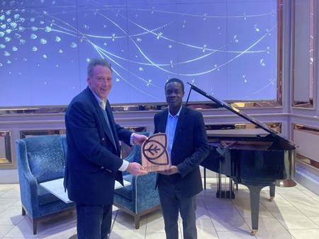 Gideon Awolola receiving the the CarbonStore Top Performing Student Award 