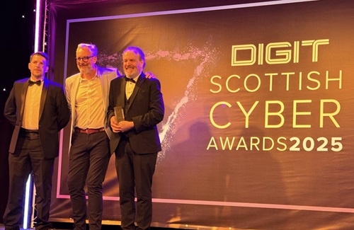 Prof Bill Buchanan receives his awards at the Scottish Cyber Awards 2025
