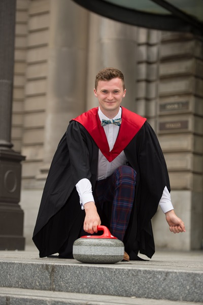 International curler Bruce Mouat posing at his graduation