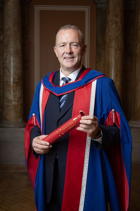 Rugby coach Richie Gray with his honorary doctorate