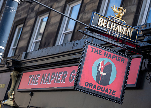 Pub signs showing the name The Napier Graduate