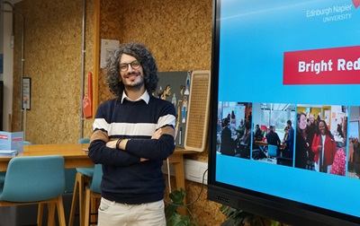 Leonardo Binetti standing in the Bright Red Triangle studio