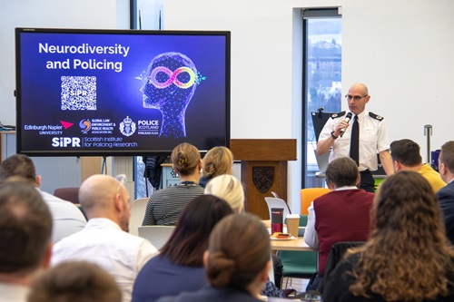 Assistant Chief Constable Mark Sutherland speaking to the audience at the Neurodiversity in Policing conference