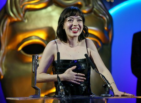 Marli Sui in dark dress on stage at the BAFTA Scotland awards