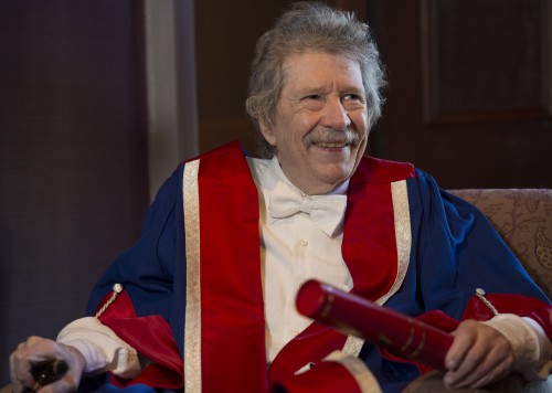 Jim Haynes posing with his honorary degree