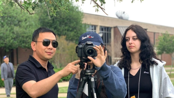 Students filming on location