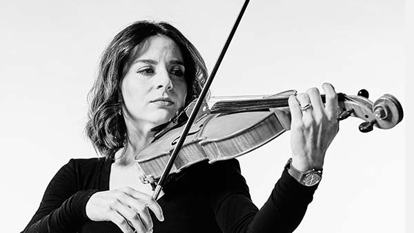 Arianna, a PhD student trailblazing the Community Instrumental Music Service for Rural Scotland, plays her violin